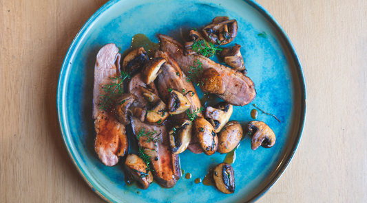 Duck with Lir Whiskey Glaze & Flamed Mushrooms